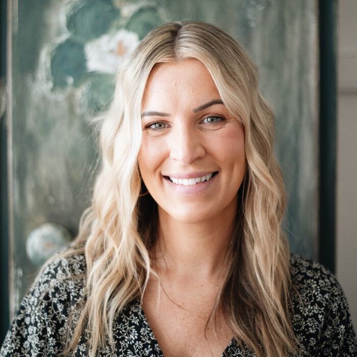 Illustrative stock portrait for Katie DeMari review